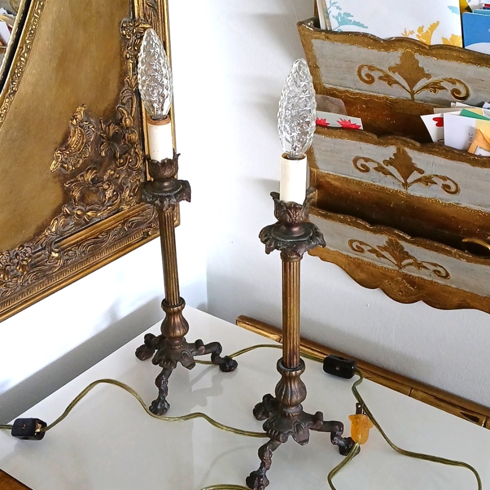 Pair of antique brass or bronze candlestick table lamps.
